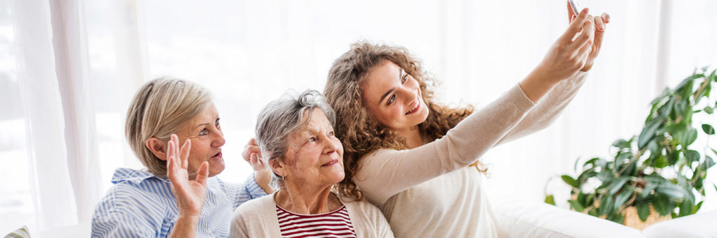 three generations of women taking a selfie